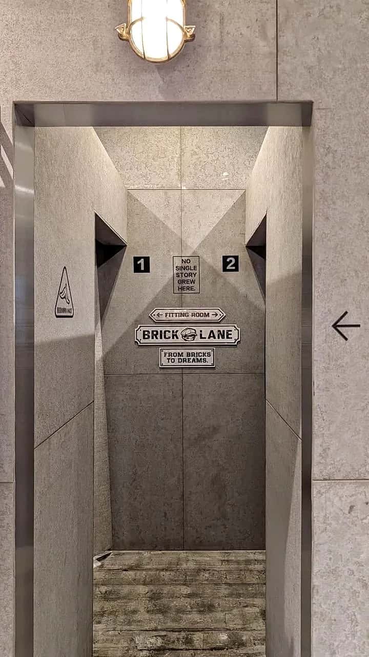 The Brick Lane street sign cast into the concrete wall inside the Herono unit MO Team fitted out