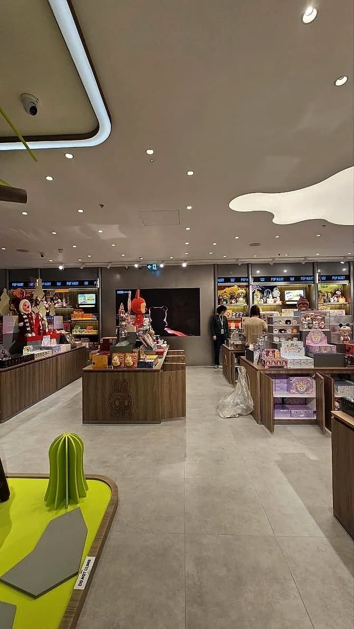 The cloud ceiling light again over the shop floor of the Pop Mart store MO Team fitted out in Oxford